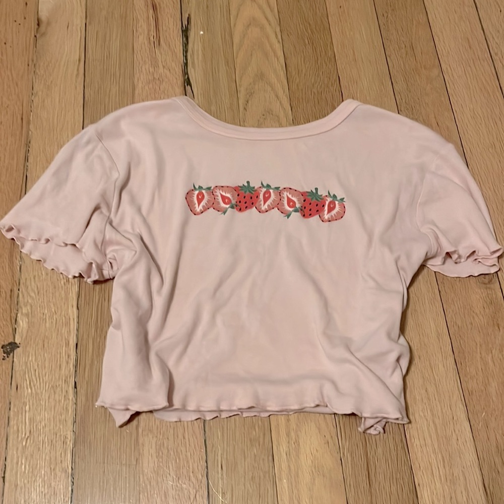 Light pink crop with strawberries.